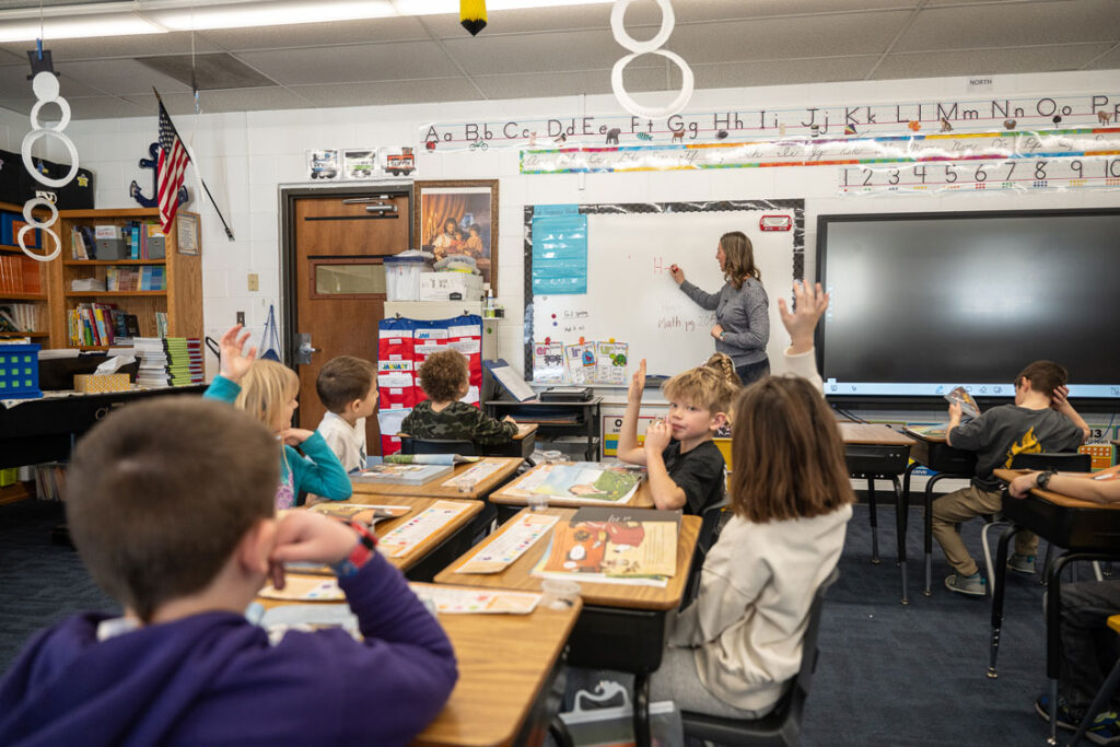Teacher teaching students in a classroom at a private school in Greenfield, MN
