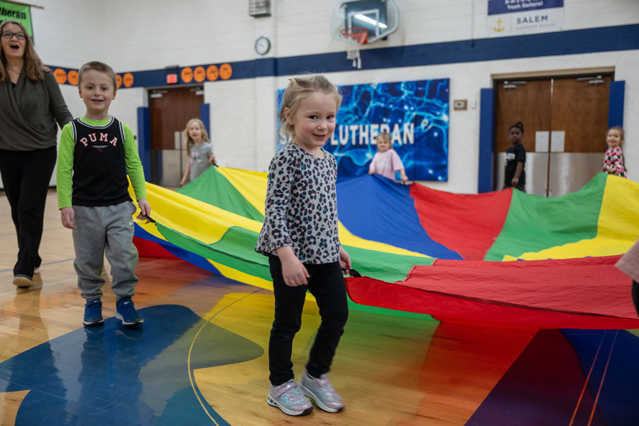 Preschool students having fun in Salem Lutheran School's gymnasium in Greenfield MN
