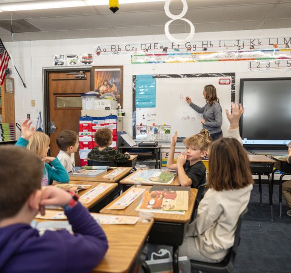 Teacher teaching students in a classroom at a private school in Greenfield, MN
